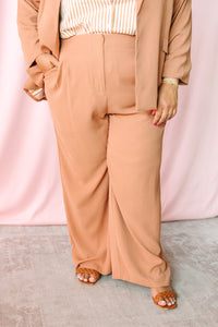Close-up of Hazelnut Wide Leg Pants showing wide leg silhouette and flowing recycled poly fabric — plus-size work pants