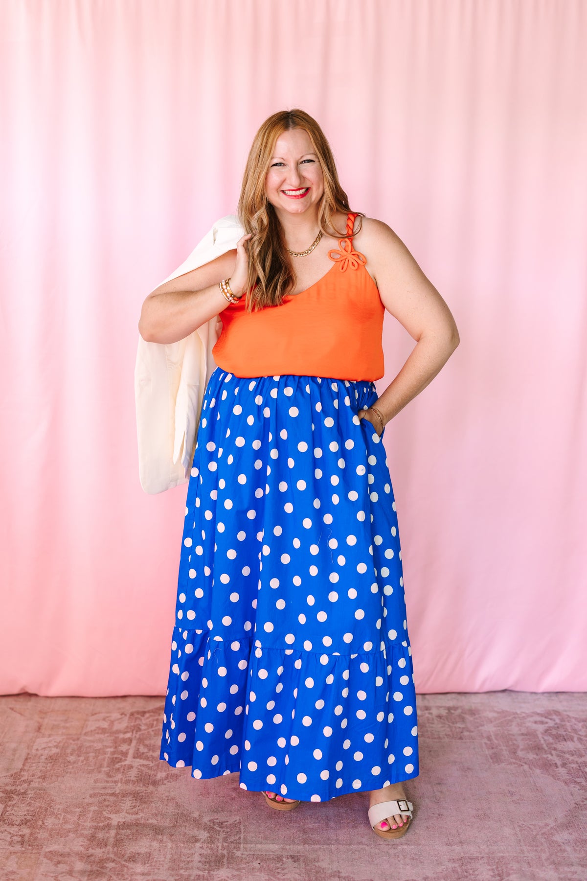 Full length look at blue maxi skirt with white polka dots