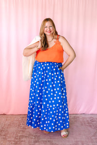 Full length look at blue maxi skirt with white polka dots