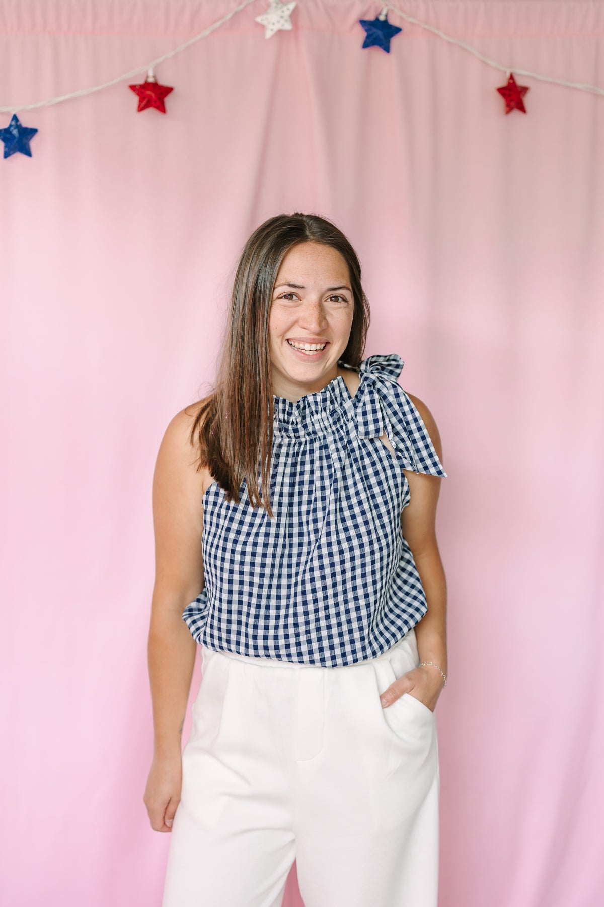 Women's navy and white gingham tie-shoulder top with bow detail