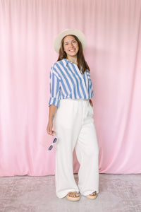White wide leg pants with soft knit fabric and relaxed silhouette 