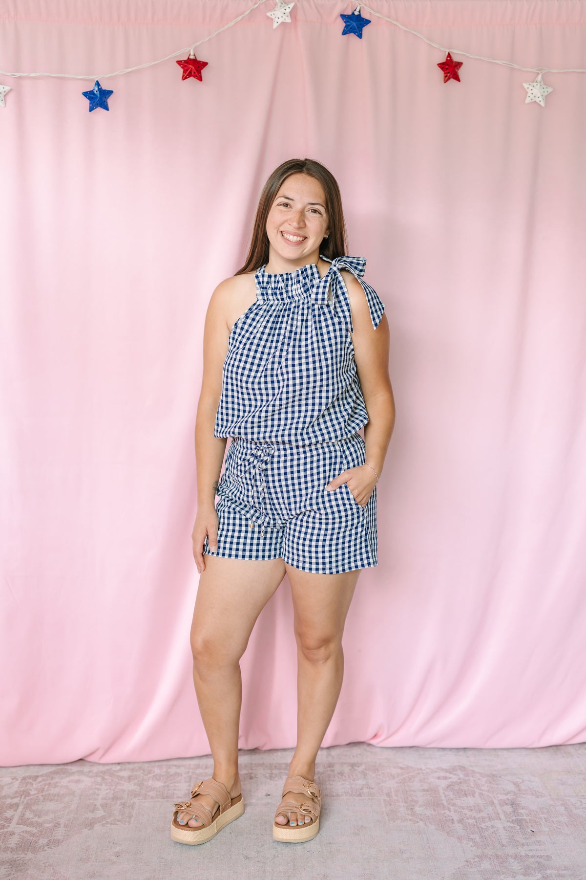 Navy gingham shorts with elastic waist and side pockets, styled for a summer Fourth of July outfit