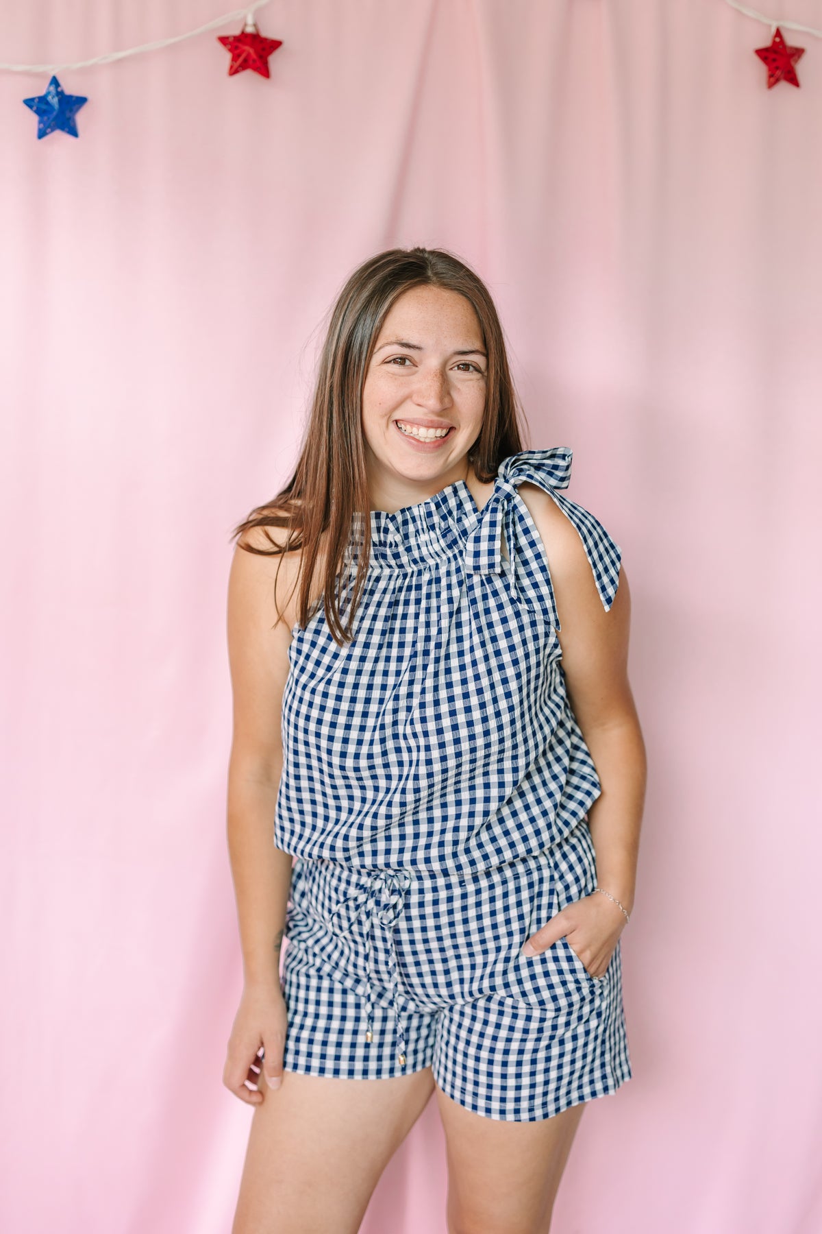 Flowy navy gingham top with tie shoulder — summer outfit styling