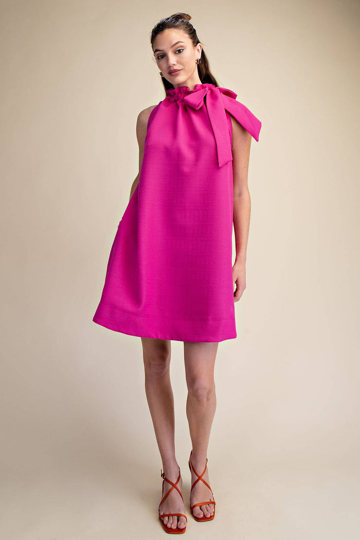 Magenta sleeveless mini dress with tie-front ruffle neckline and relaxed fit