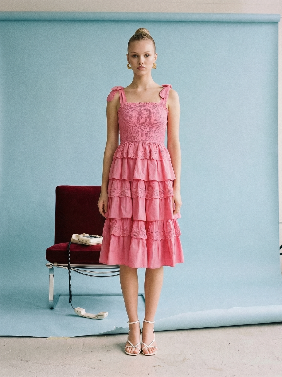 Fuchsia tiered ruffle midi dress with smocked bodice, adjustable tie straps, and lightweight cotton fabric
